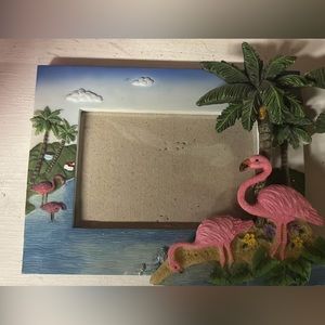 Two decorative beach-theme picture frames